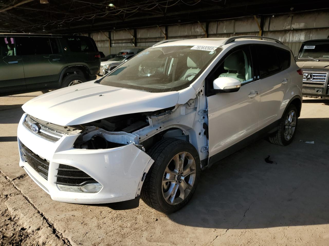 Obraz 1 z 2014 FORD ESCAPE TITANIUM 2014 z VIN 1FMCU0J93EUD01744