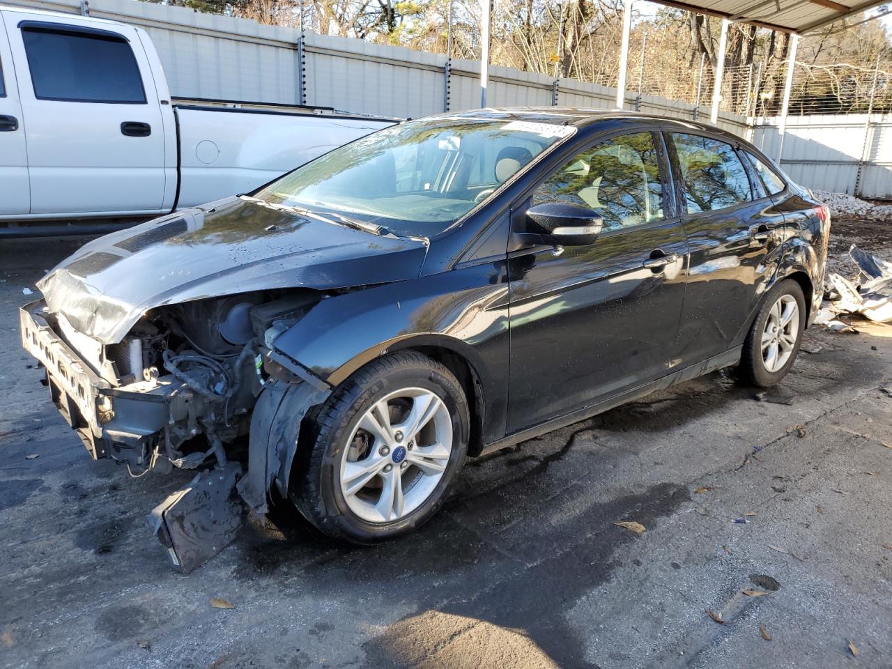 Obraz 1 z 2014 FORD FOCUS SE 2014 z VIN 1FADP3F21EL402628
