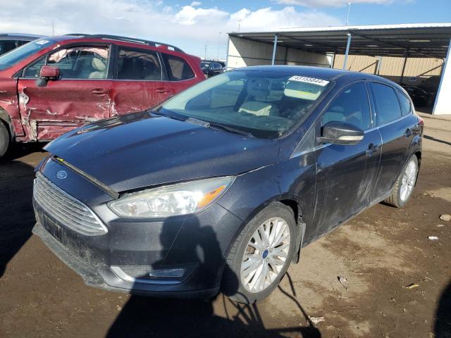 Image 1 of 2015 FORD FOCUS TITANIUM 2015 with VIN 1FADP3N27FL204915