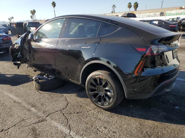 Obraz 2 z 2023 TESLA MODEL Y  2023 z VIN 7SAYGDEE4PA024050