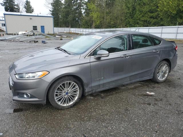 Image 1 of 2014 FORD FUSION SE HYBRID 2014 with VIN 3FA6P0LU8ER380321