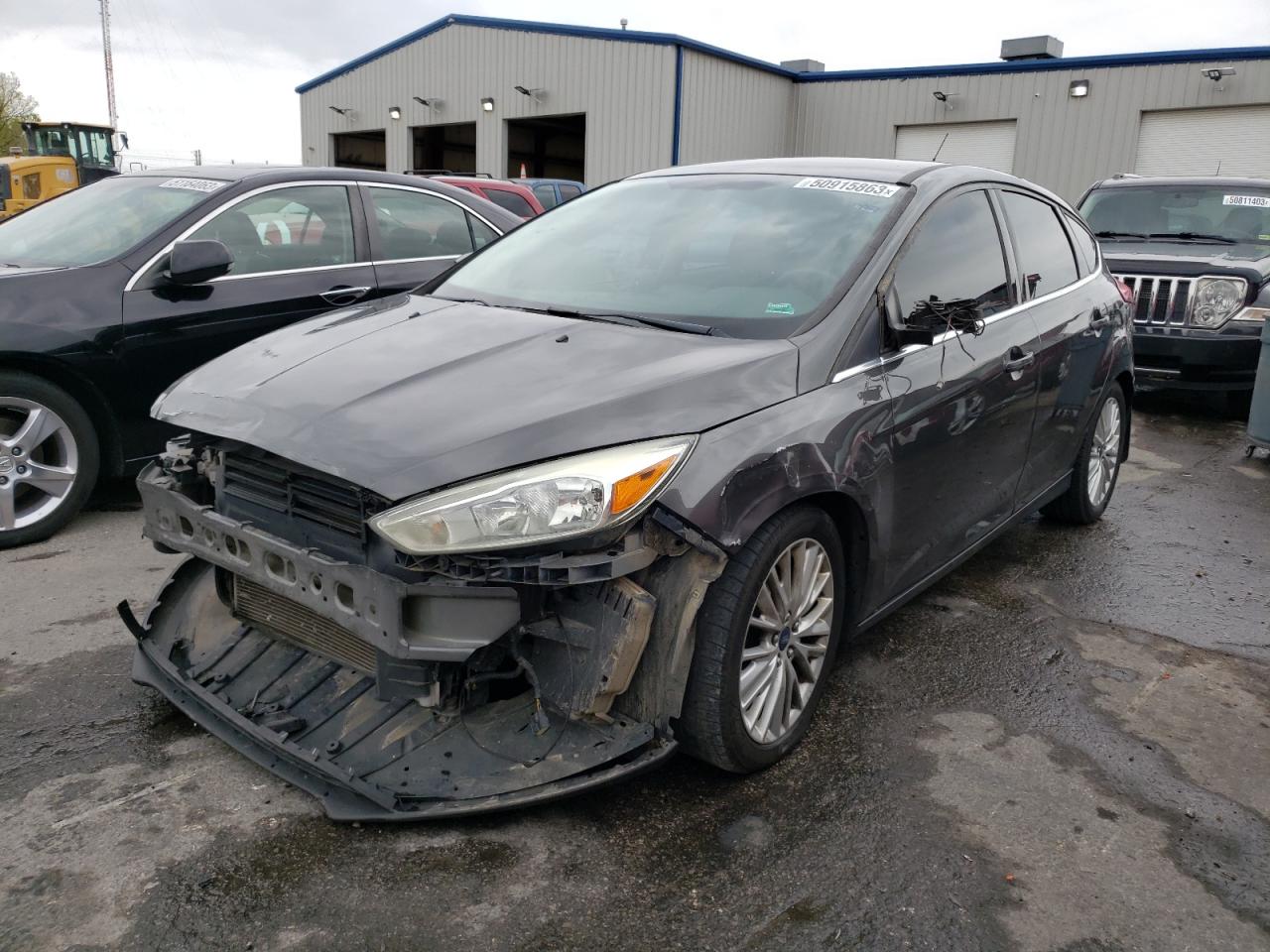 Image 1 of 2015 FORD FOCUS TITANIUM 2015 with VIN 1FADP3N21FL228448
