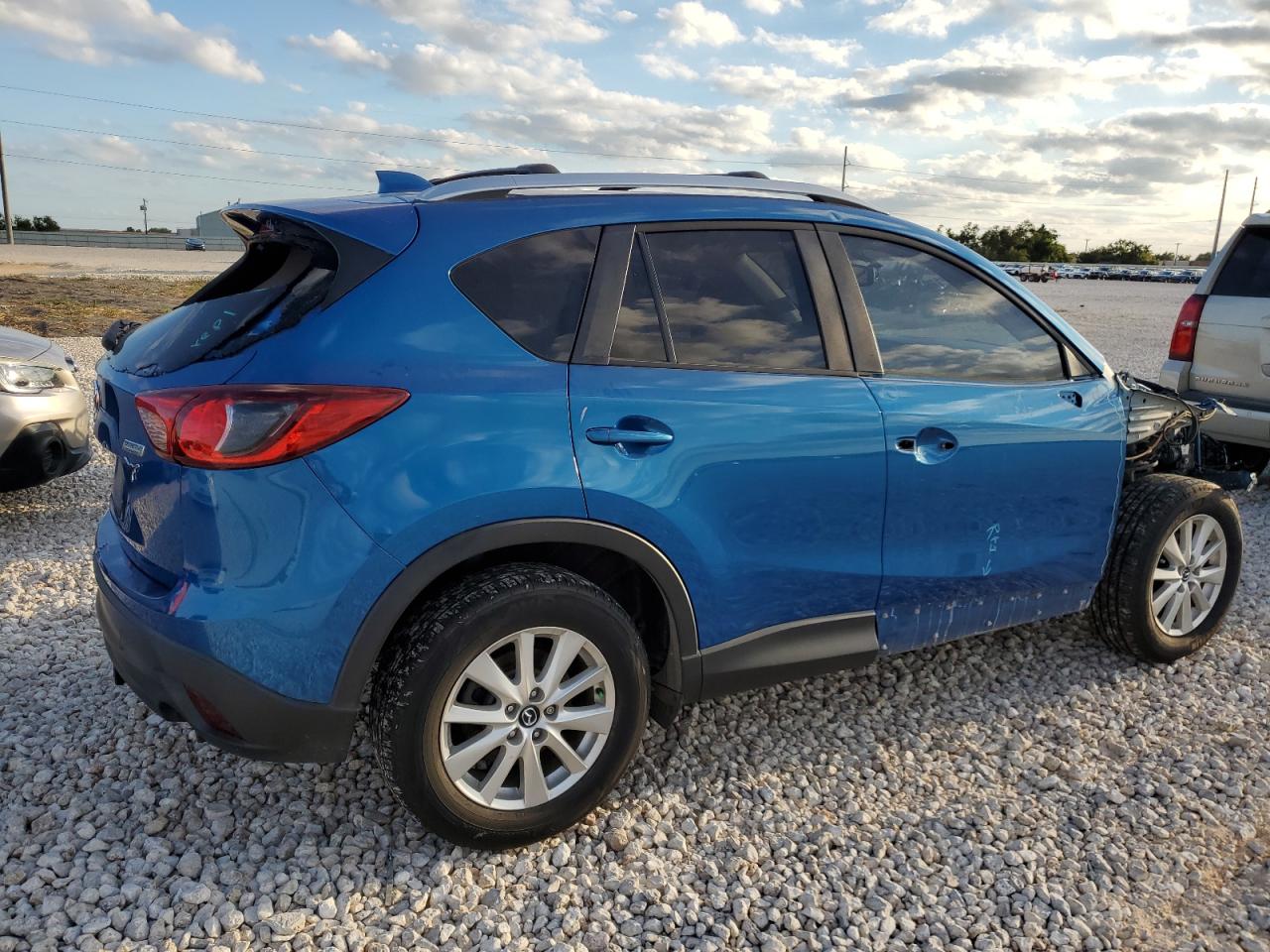 Image 3 of 2014 MAZDA CX-5 TOURING 2014 with VIN JM3KE2CY4E0380904