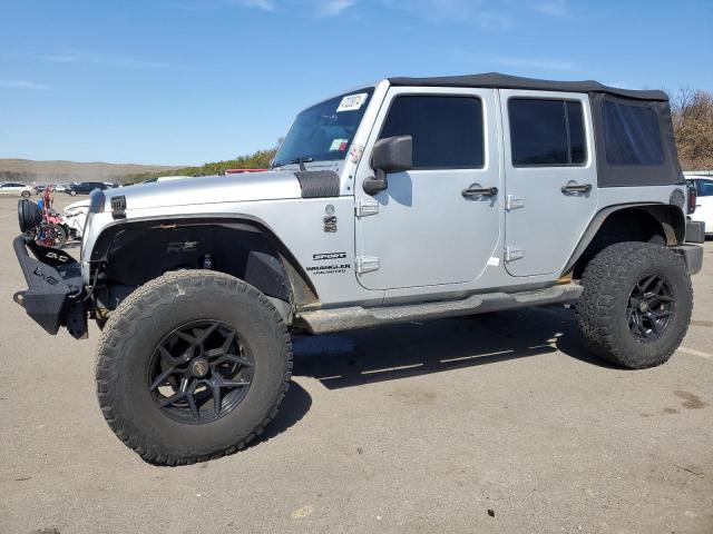 Obraz 1 z 2012 JEEP WRANGLER UNLIMITED SPORT 2012 z VIN 1C4BJWDG0CL116933