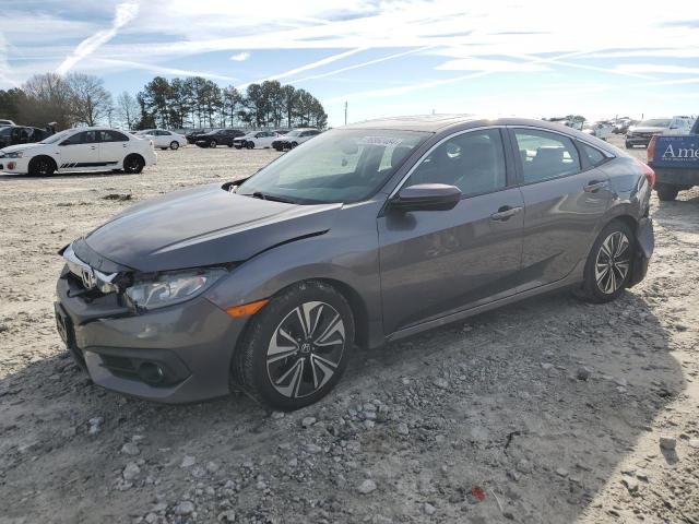 Obraz 1 z 2017 HONDA CIVIC EXL 2017 z VIN 19XFC1F77HE015383