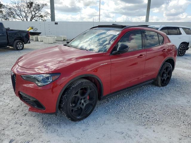 Image 1 of 2024 ALFA ROMEO STELVIO TI 2024 with VIN ZASPAKBN2R7D74850