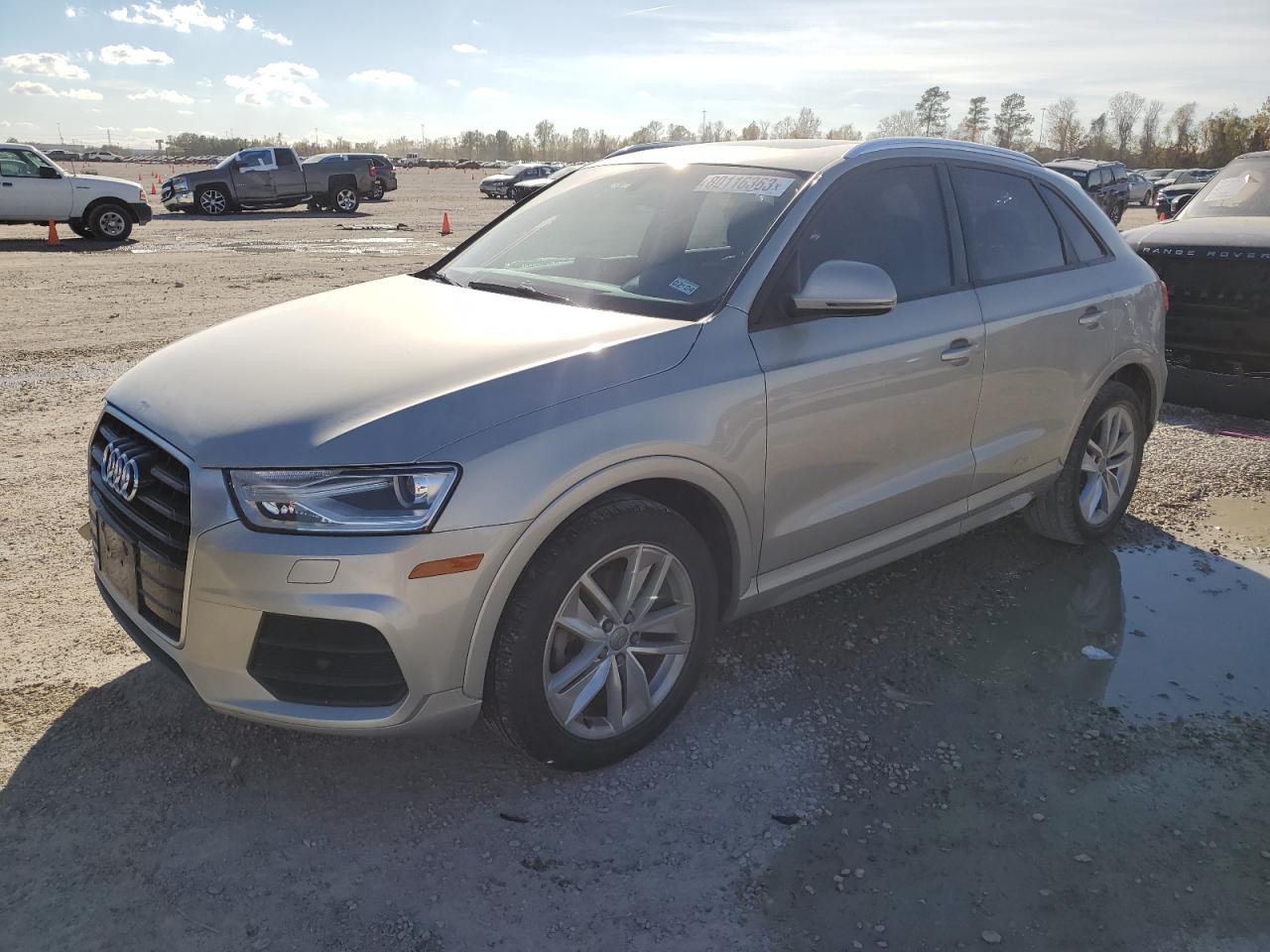 Image 1 of 2017 AUDI Q3 PREMIUM 2017 with VIN WA1BCCFS9HR015656