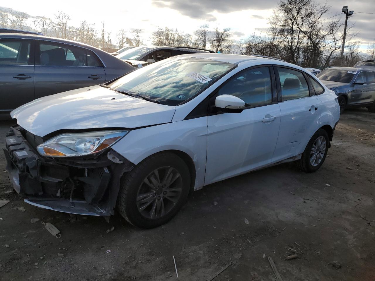 Image 1 of 2013 FORD FOCUS SE 2013 with VIN 1FADP3F24DL358882