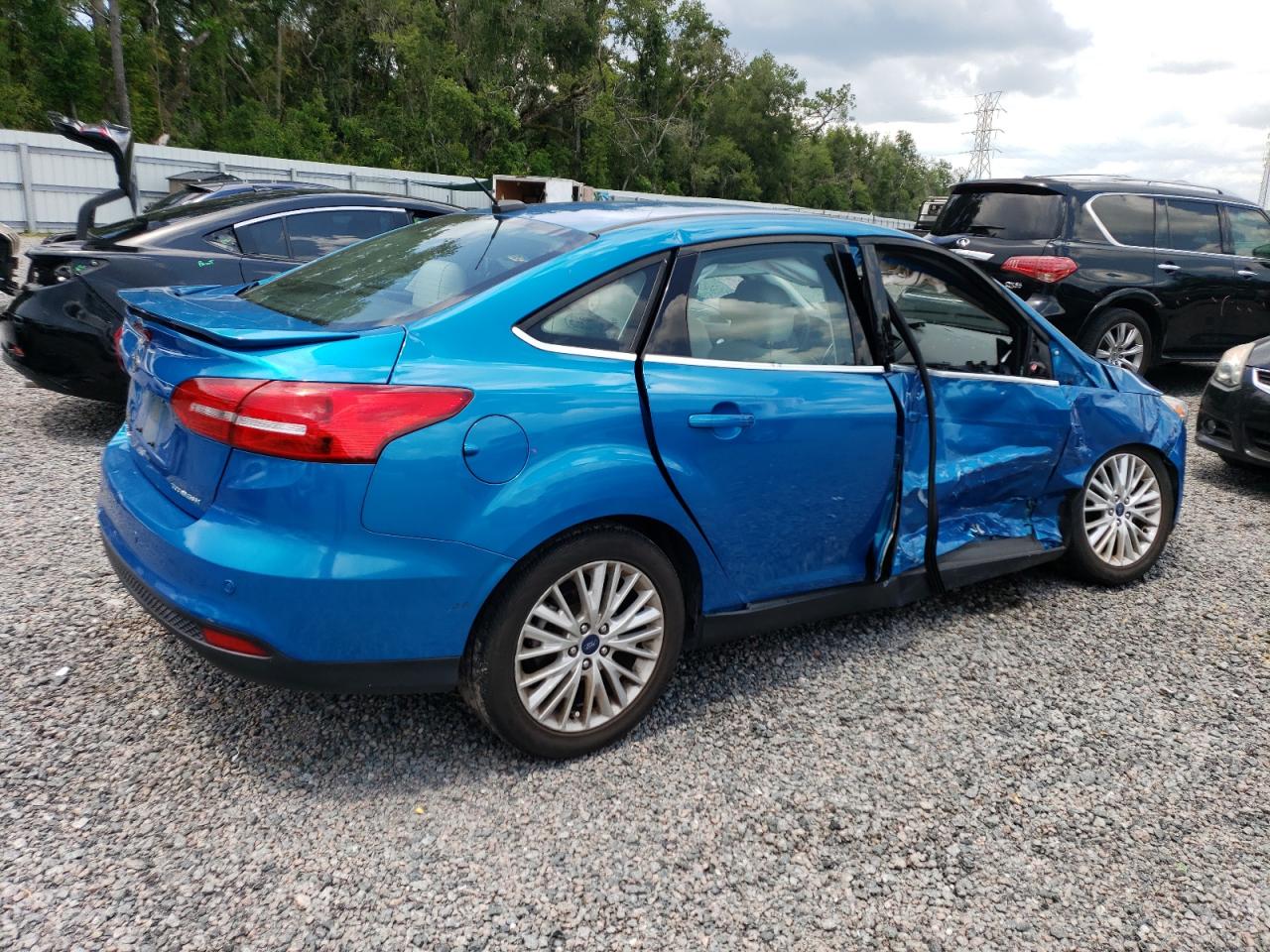 Image 3 of 2017 FORD FOCUS TITANIUM 2017 with VIN 1FADP3J27HL212960