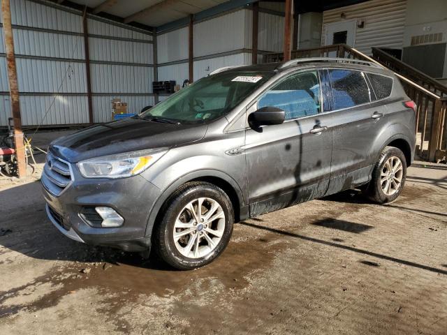 Image 1 of 2018 FORD ESCAPE SE 2018 with VIN 1FMCU9GD0JUA15926