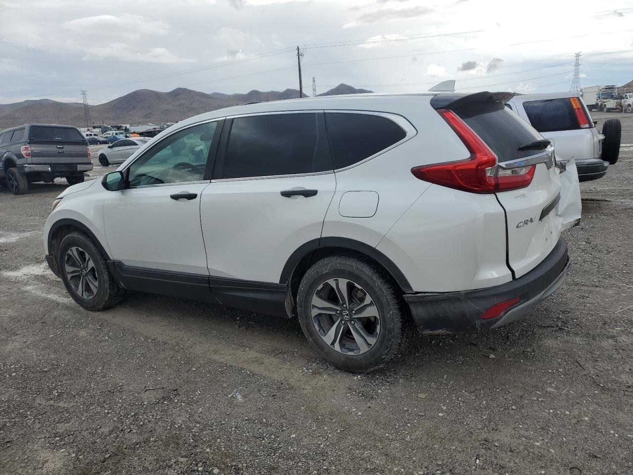 Изображение 2 2019 HONDA CR-V LX 2019 с VIN 2HKRW5H30KH419814