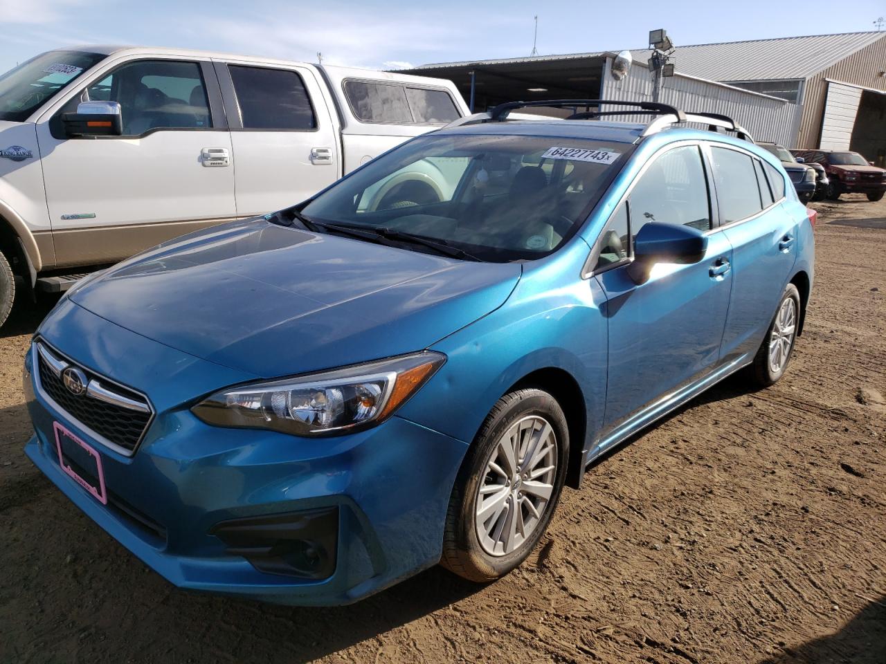 Image 1 of 2017 SUBARU IMPREZA PREMIUM 2017 with VIN 4S3GTAB66H3715582