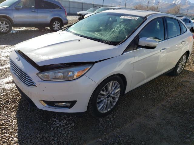 Image 1 of 2016 FORD FOCUS TITANIUM 2016 with VIN 1FADP3J2XGL334839