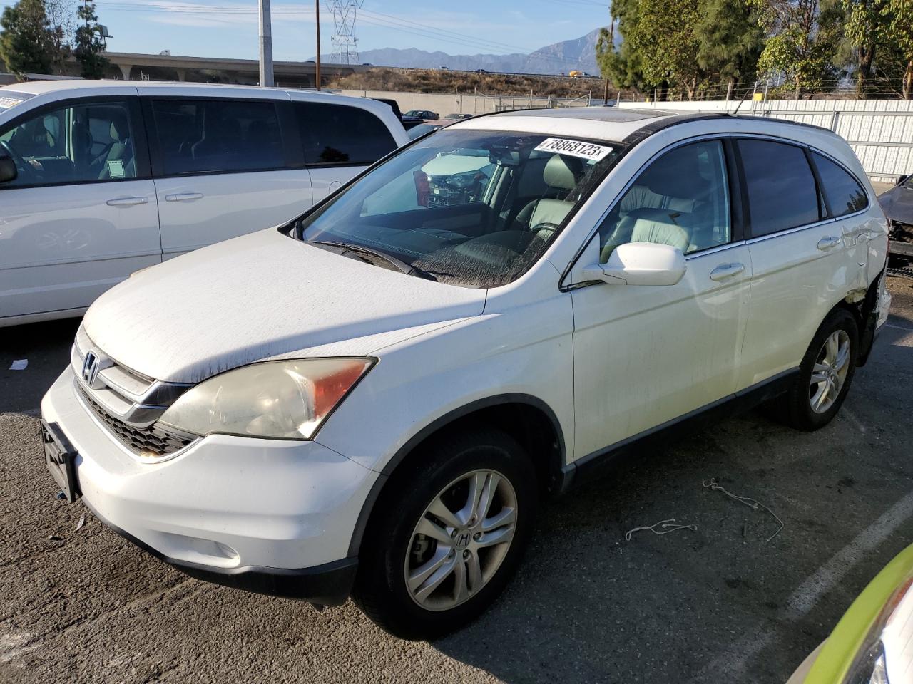 Изображение 1 2010 HONDA CR-V EXL 2010 с VIN 5J6RE3H70AL019055