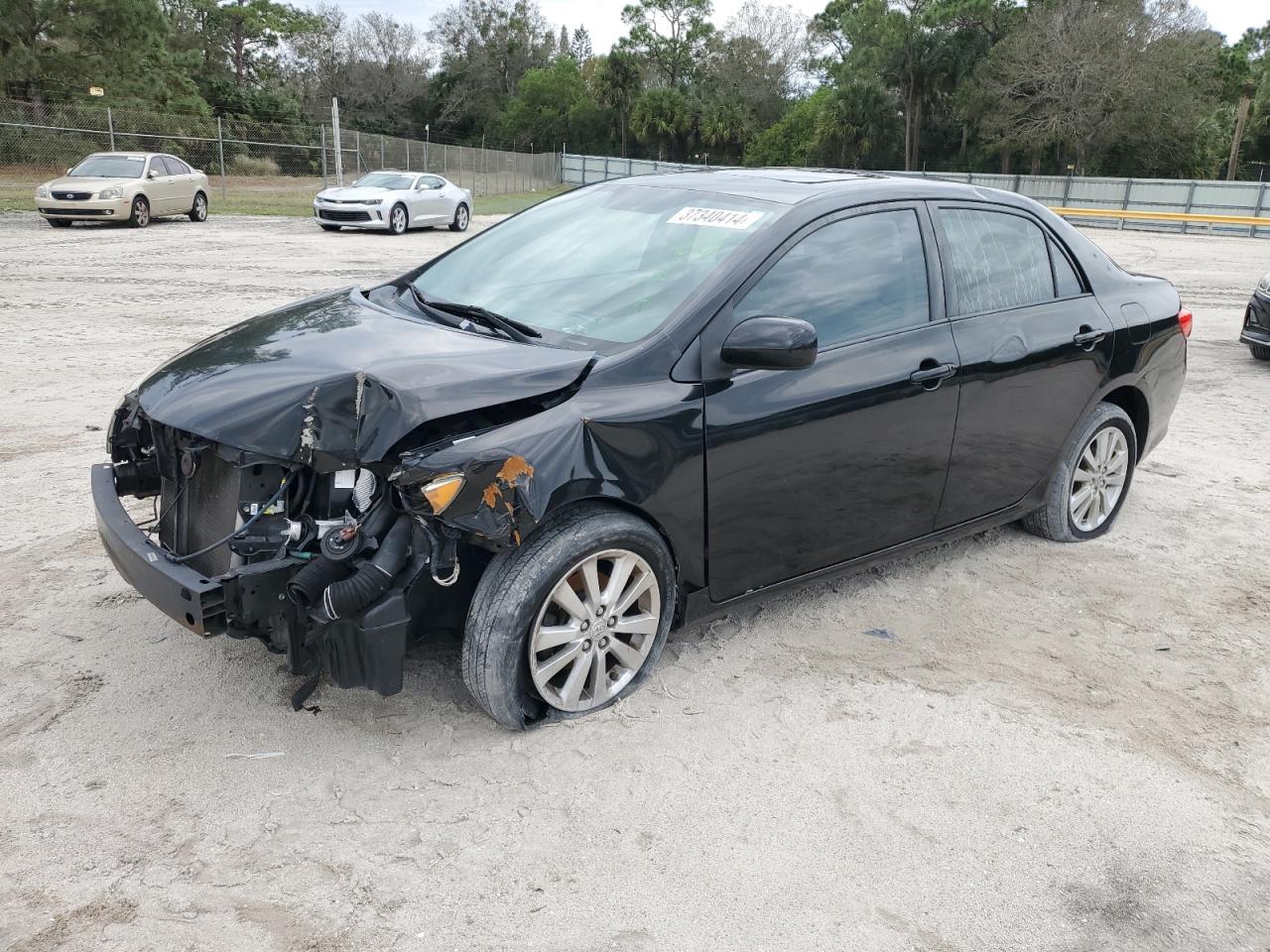 Obraz 1 z 2009 TOYOTA COROLLA BASE 2009 z VIN 1NXBU40EX9Z155558