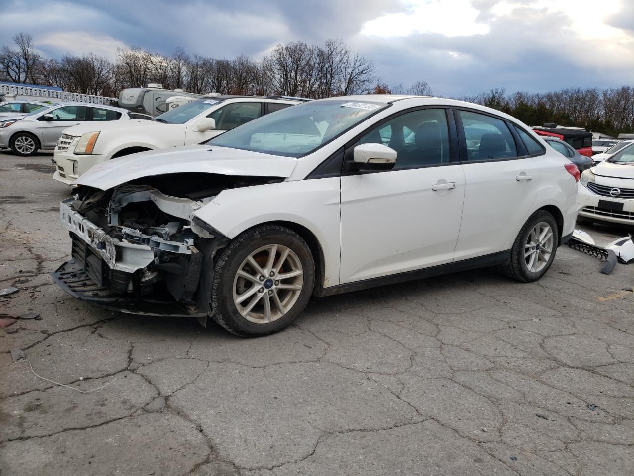 Image 1 of 2016 FORD FOCUS SE 2016 with VIN 1FADP3F26GL322017