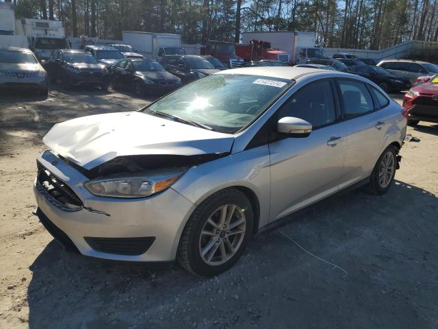 Image 1 of 2017 FORD FOCUS SE 2017 with VIN 1FADP3FE9HL311895
