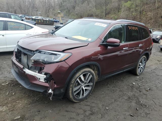 Изображение 1 2018 HONDA PILOT TOURING 2018 с VIN 5FNYF6H99JB019348