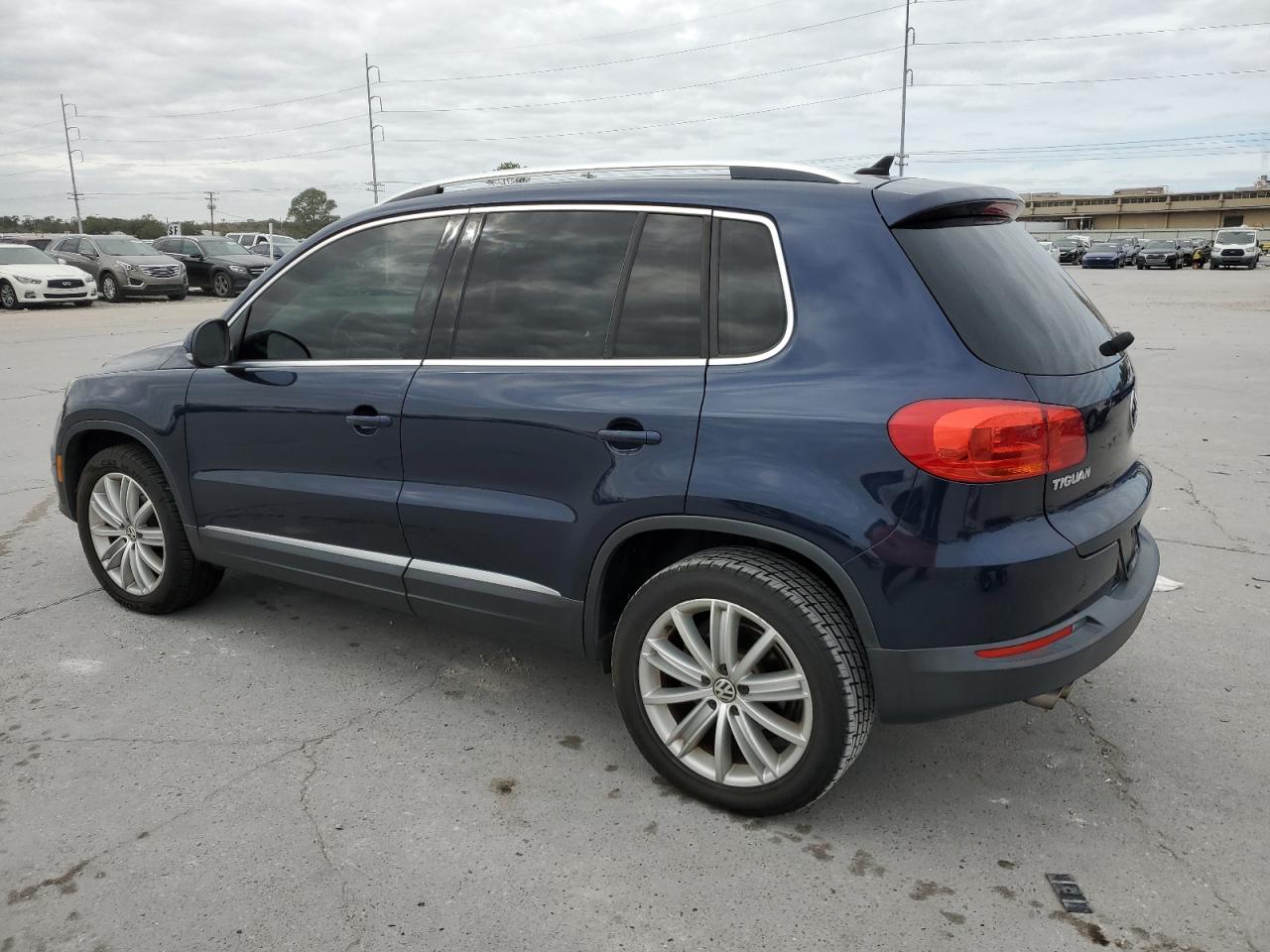 Image 2 of 2013 VOLKSWAGEN TIGUAN S 2013 with VIN WVGAV3AX2DW616543