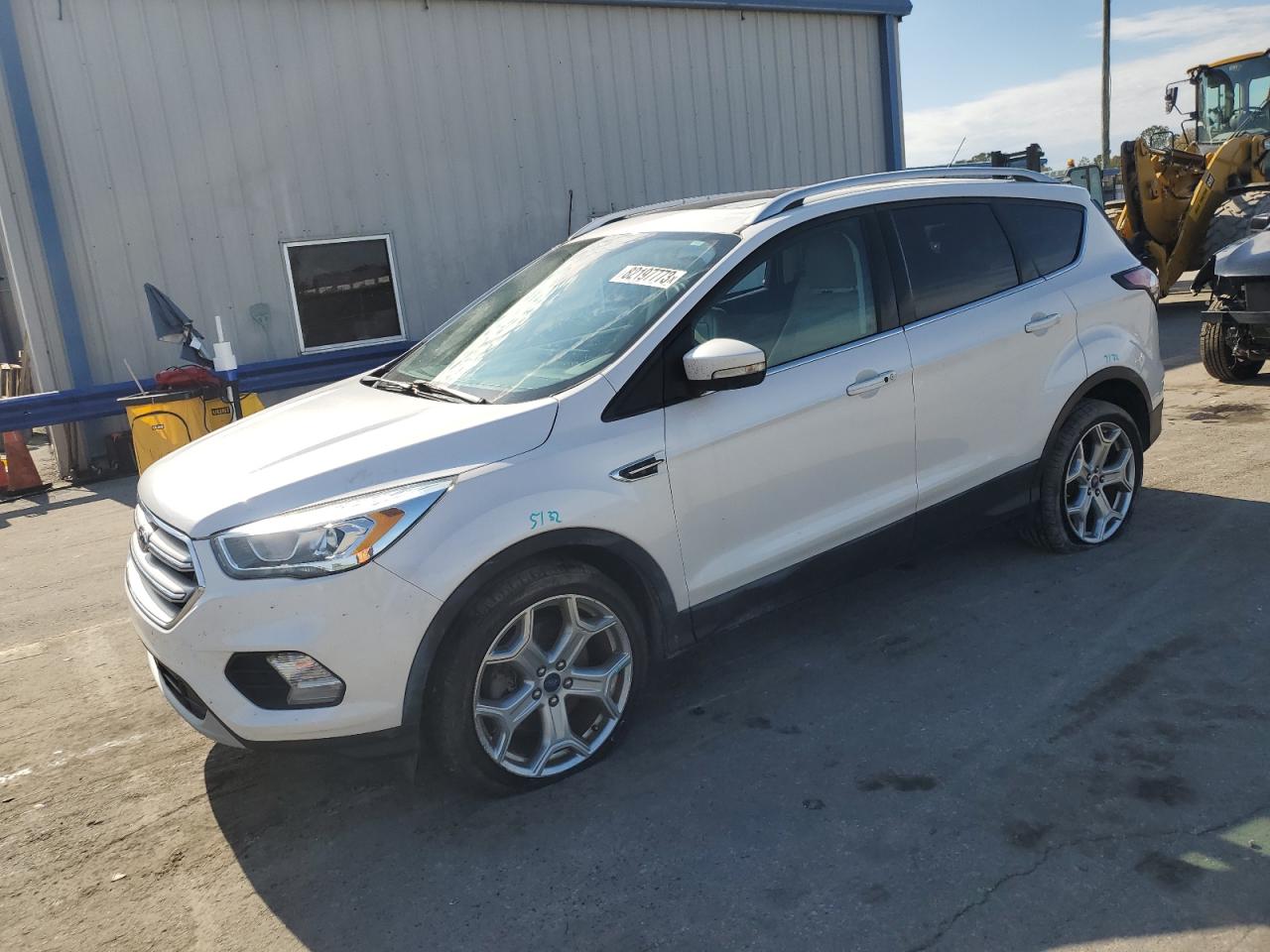 Image 1 of 2017 FORD ESCAPE TITANIUM 2017 with VIN 1FMCU0J96HUE29562