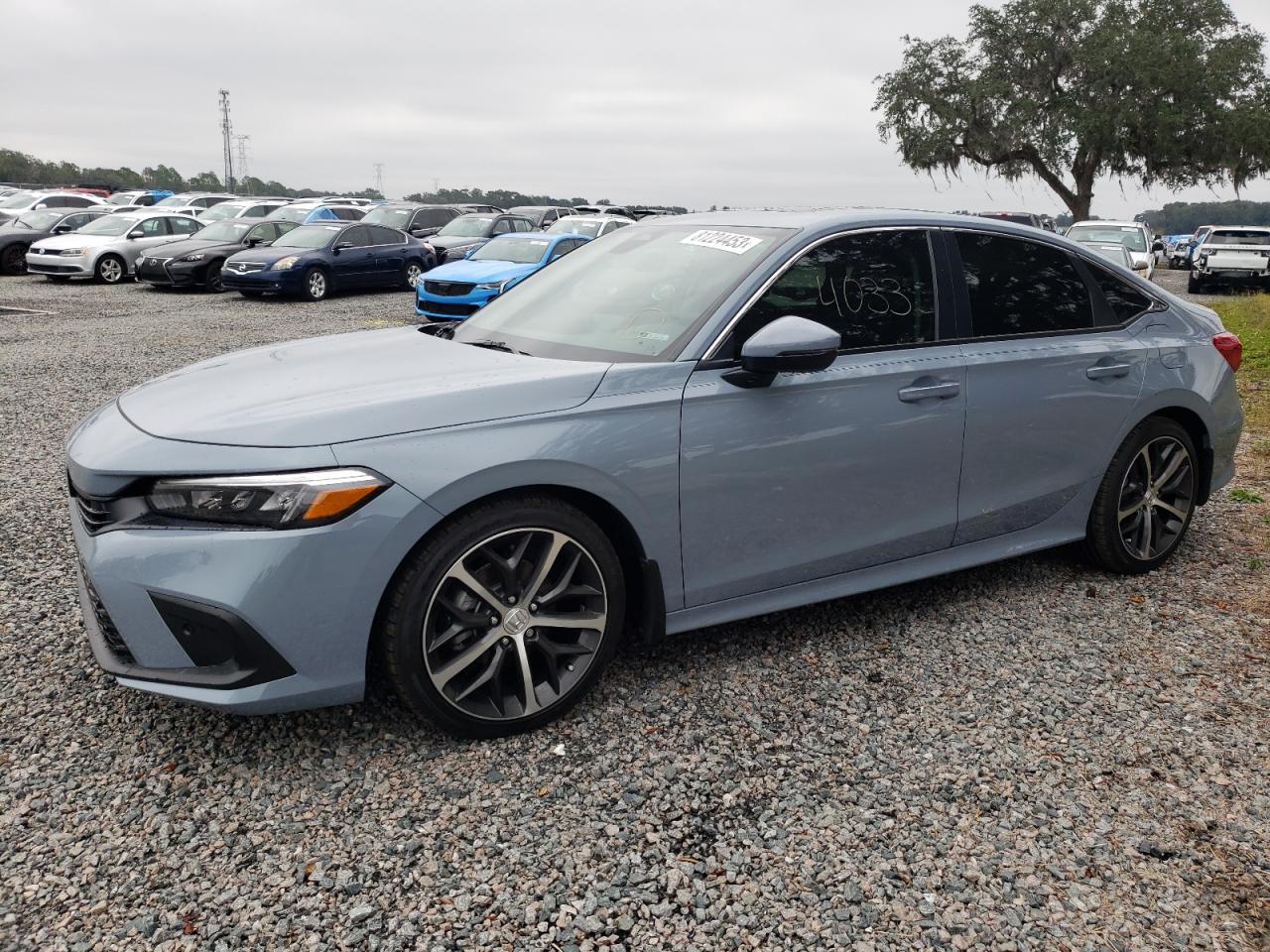 Image 1 of 2024 HONDA CIVIC TOURING 2024 with VIN 2HGFE1F96RH302572