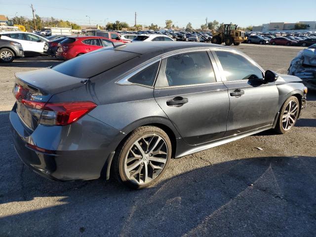 Obraz 3 z 2023 HONDA CIVIC TOURING 2023 z VIN 2HGFE1F98PH302344