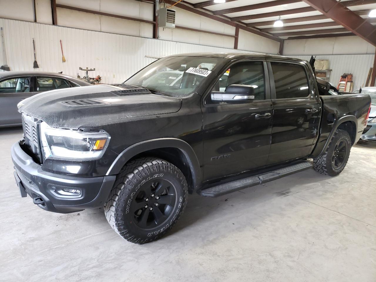 Image 1 of 2021 RAM 1500 REBEL 2021 with VIN 1C6SRFLT9MN673070