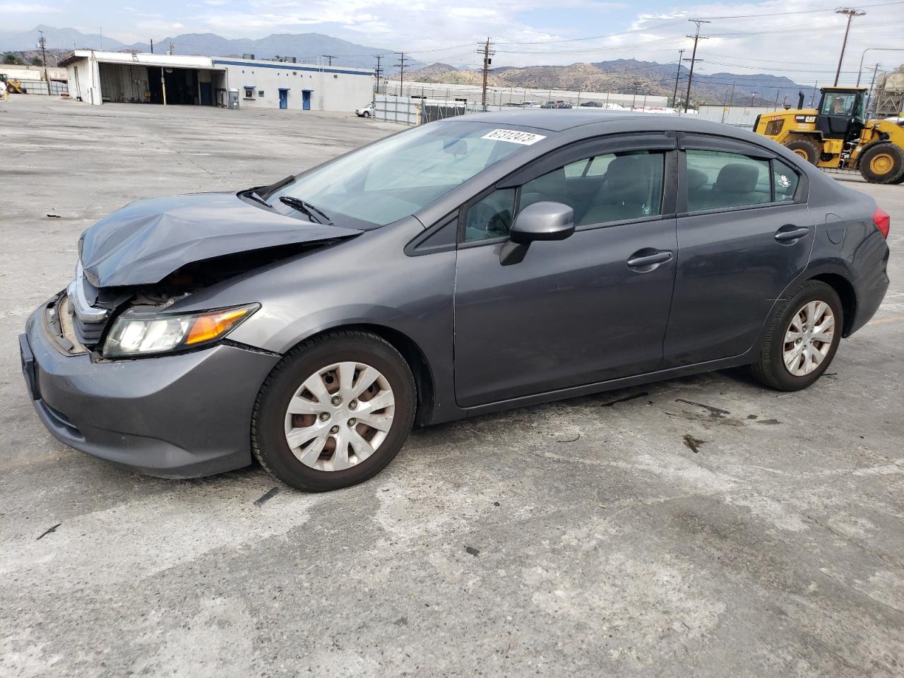 Obraz 1 z 2012 HONDA CIVIC LX 2012 z VIN 2HGFB2F59CH570387