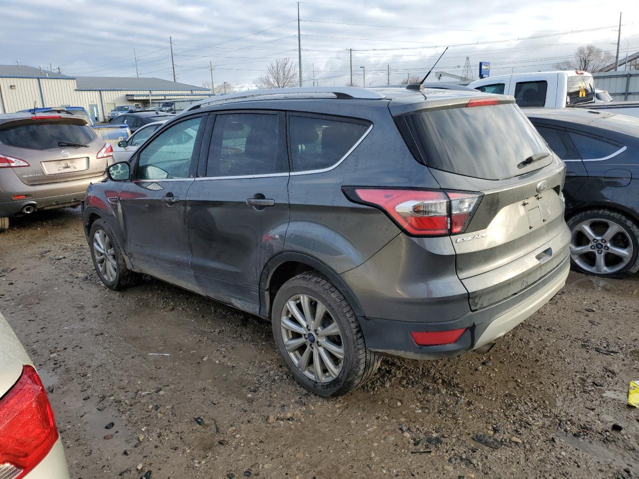 Изображение 2 2017 FORD ESCAPE TITANIUM 2017 с VIN 1FMCU0JD6HUE33647