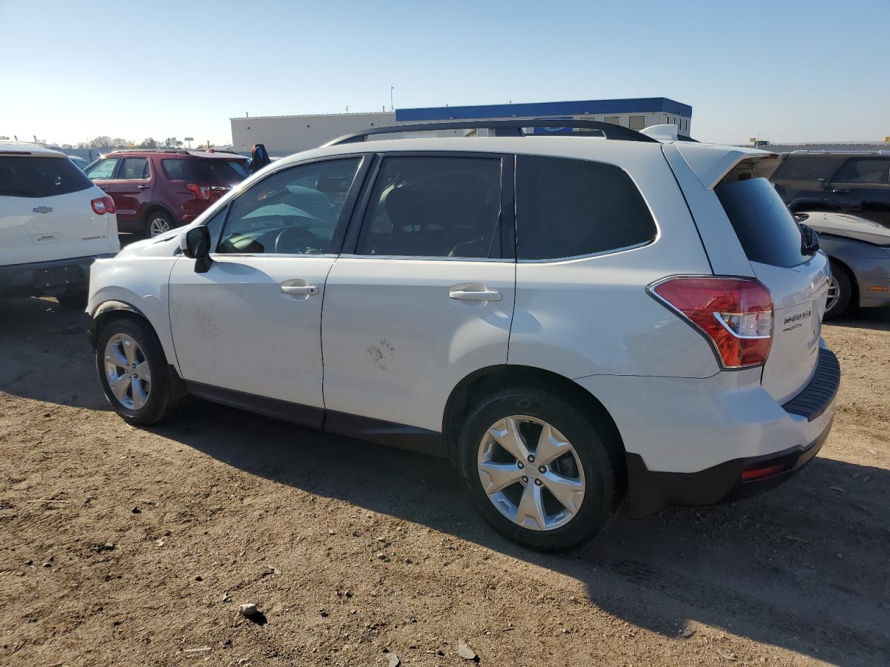 Image 2 of 2016 SUBARU FORESTER 2.5I LIMITED 2016 with VIN JF2SJAHC0GH494027