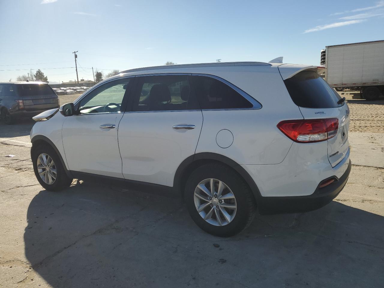 Изображение 2 2016 KIA SORENTO LX 2016 с VIN 5XYPG4A34GG087884