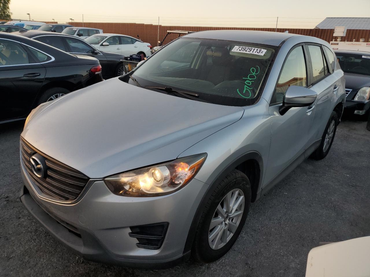 Image 1 of 2016 MAZDA CX-5 SPORT 2016 with VIN JM3KE2BY0G0736446