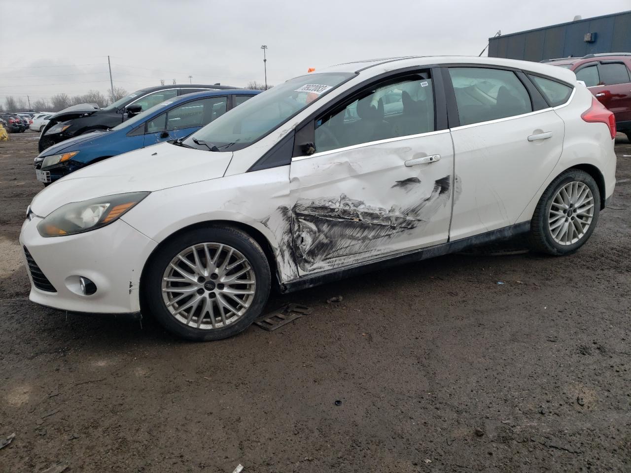 Image 1 of 2013 FORD FOCUS TITANIUM 2013 with VIN 1FADP3N27DL177552