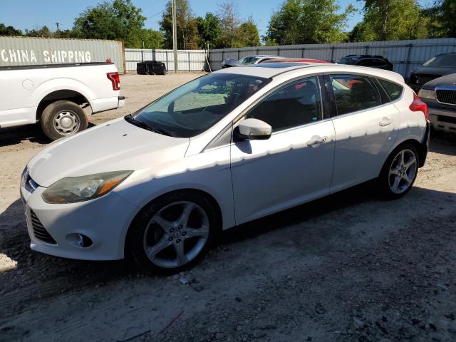 Image 1 of 2014 FORD FOCUS TITANIUM 2014 with VIN 1FADP3N23EL104177