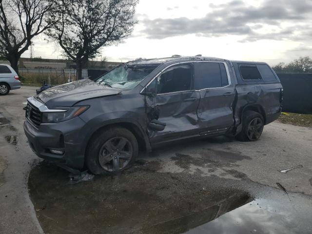 Obraz 1 z 2021 HONDA RIDGELINE RTL 2021 z VIN 5FPYK3F55MB024939