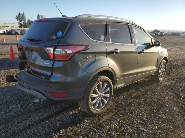 Изображение 3 2017 FORD ESCAPE TITANIUM 2017 с VIN 1FMCU0JD8HUE54886