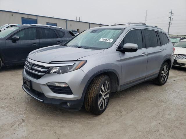 Obraz 1 z 2018 HONDA PILOT TOURING 2018 z VIN 5FNYF6H98JB040000
