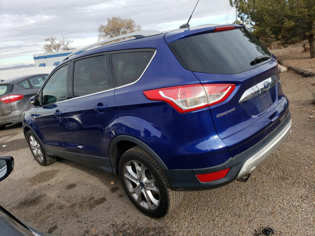 Obraz 2 z 2016 FORD ESCAPE TITANIUM 2016 z VIN 1FMCU0J90GUA44478