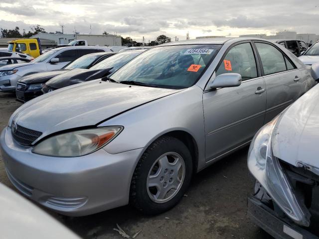Obraz 1 z 2002 TOYOTA CAMRY LE 2002 z VIN 4T1BF30K32U030322
