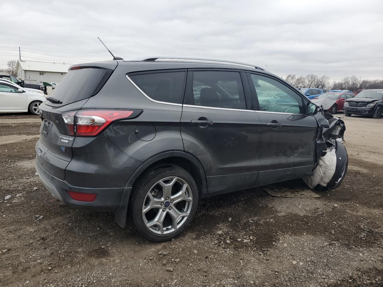 Image 3 of 2017 FORD ESCAPE TITANIUM 2017 with VIN 1FMCU0JD1HUA32166