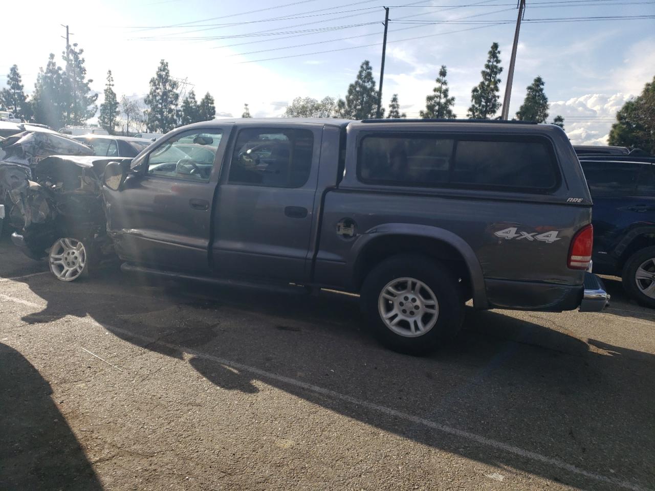 Obraz 2 z 2004 DODGE DAKOTA QUAD SPORT 2004 z VIN 1D7HG38N34S732235
