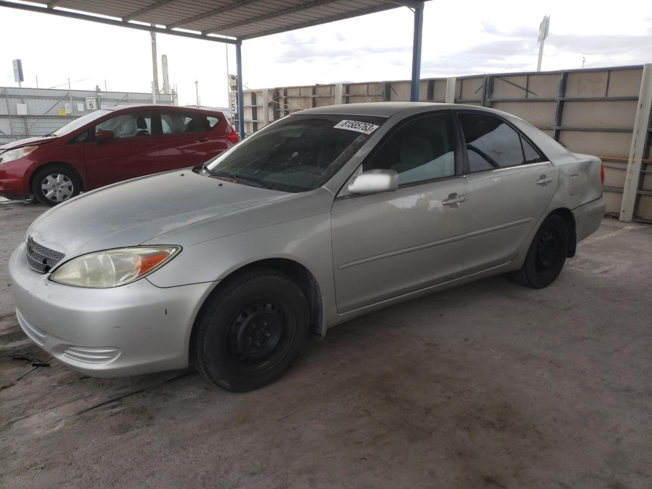Obraz 1 z 2002 TOYOTA CAMRY LE 2002 z VIN 4T1BE32K32U055169