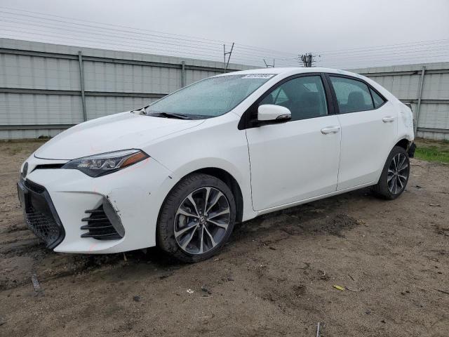 Изображение 1 2018 TOYOTA COROLLA L 2018 с VIN 5YFBURHE9JP768472