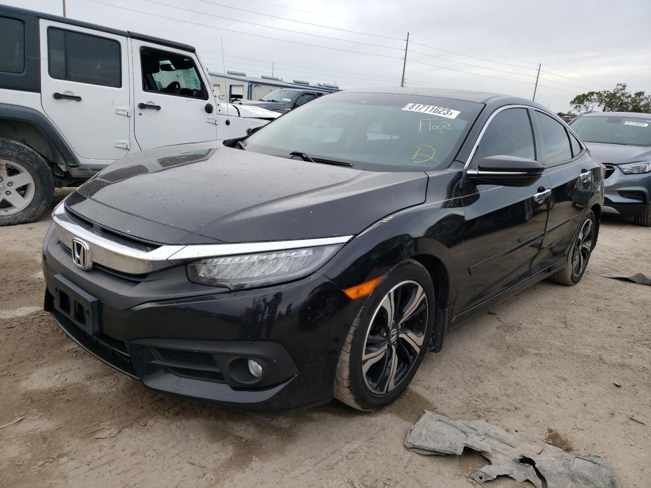 Obraz 1 z 2016 HONDA CIVIC TOURING 2016 z VIN 19XFC1F92GE001259