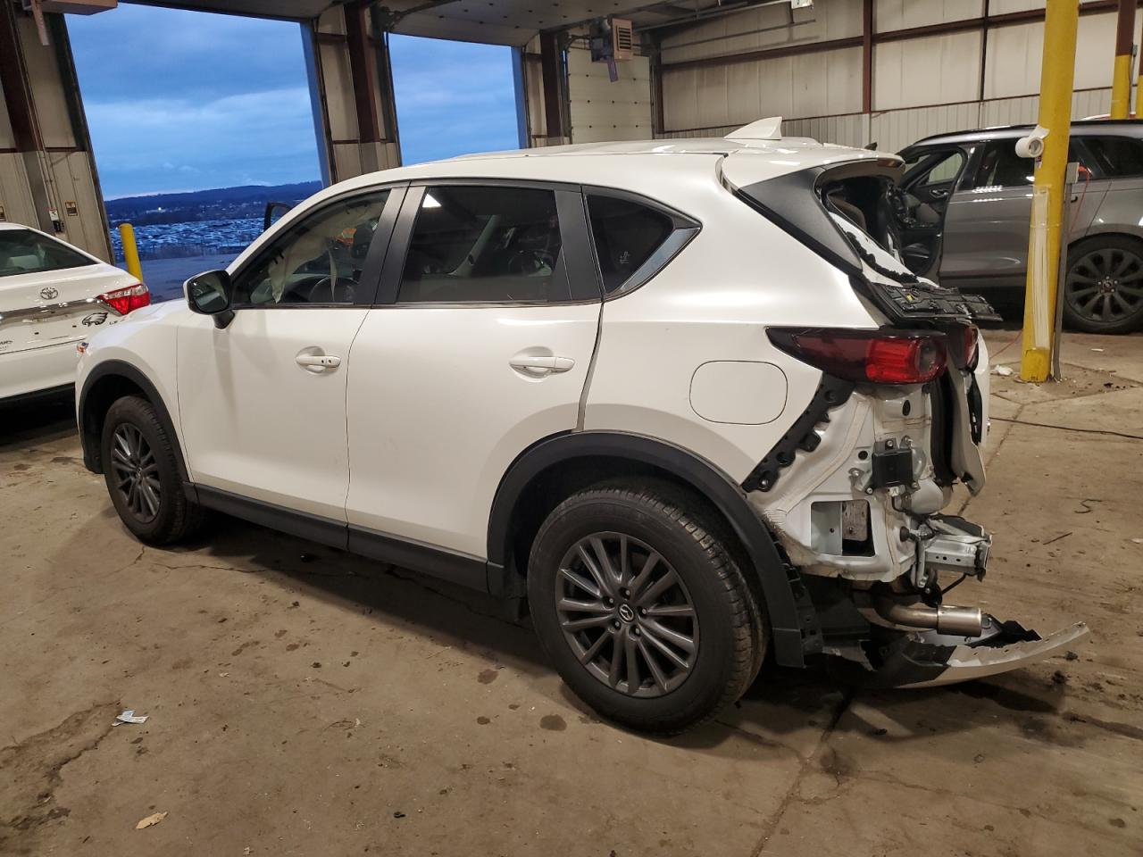 Image 2 of 2021 MAZDA CX-5 TOURING 2021 with VIN JM3KFBCM2M0389495