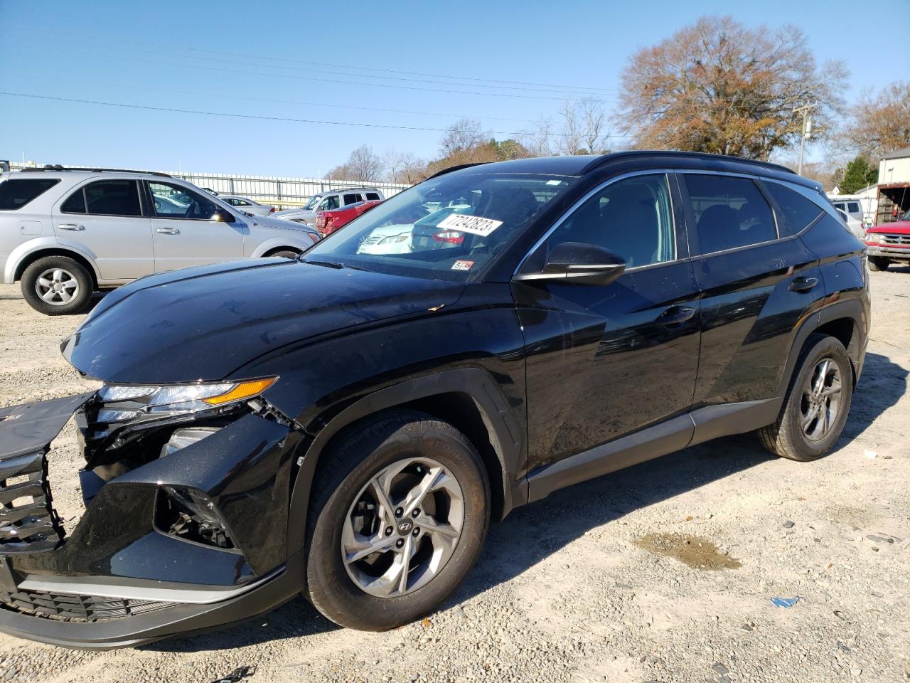 Image 1 of 2022 HYUNDAI TUCSON SEL 2022 with VIN 5NMJBCAE1NH127499