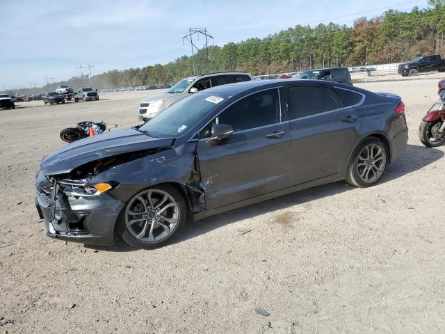 Image 1 of 2020 FORD FUSION TITANIUM 2020 with VIN 3FA6P0RU9LR129845