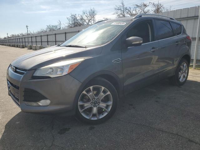 Image 1 of 2014 FORD ESCAPE TITANIUM 2014 with VIN 1FMCU0JX9EUB09095