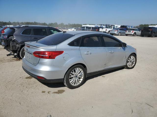Image 3 of 2016 FORD FOCUS TITANIUM 2016 with VIN 1FADP3J22GL207471