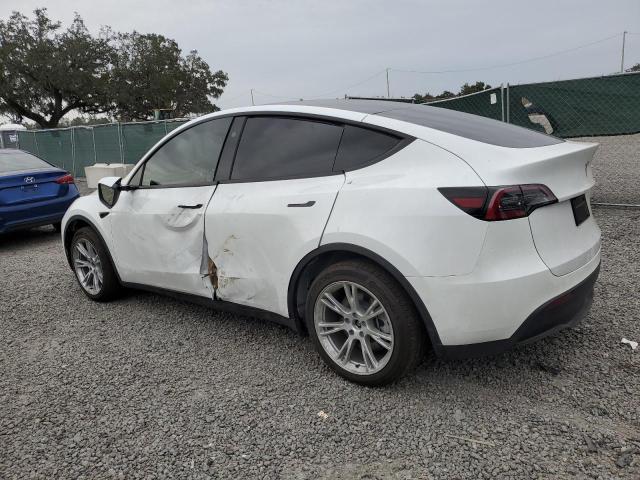 Изображение 2 2023 TESLA MODEL Y  2023 с VIN 7SAYGAEE2PF798881